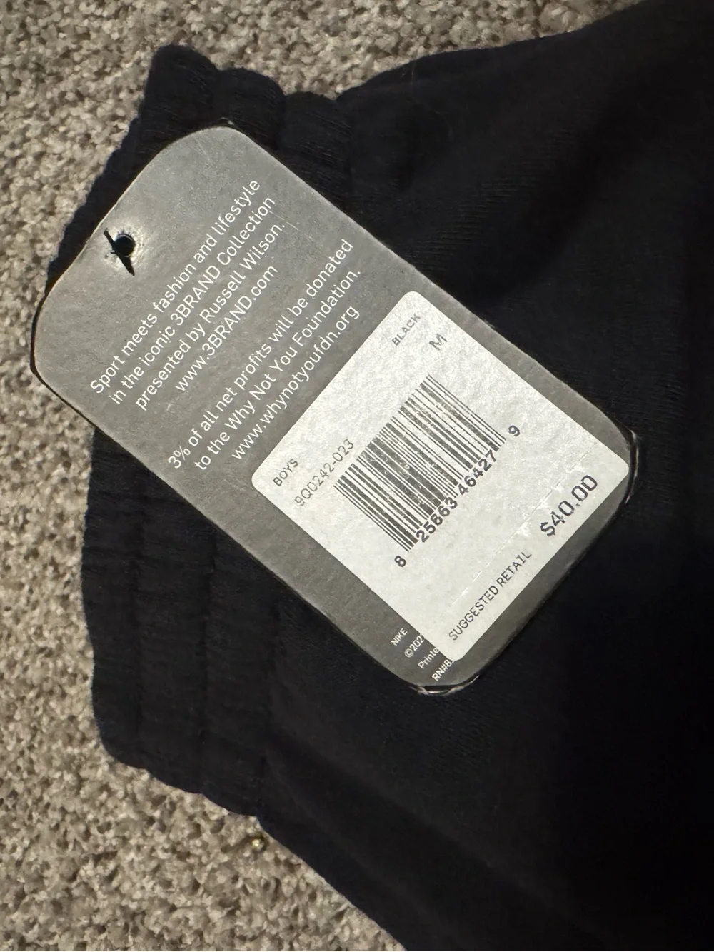 Nike Black Shorts with White Graphic Swoosh